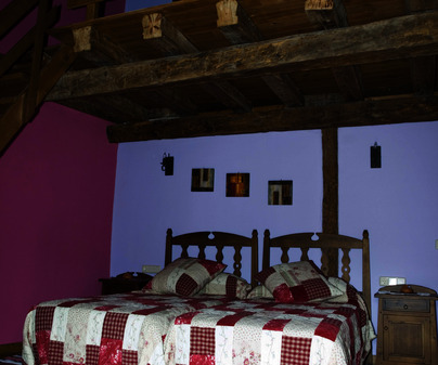 Dormitorio con altillo de Casa rural La Pinocha. Sigenza (Guadalajara)